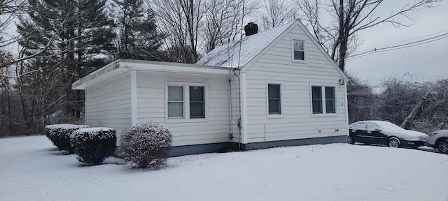 view of snow covered property