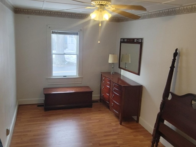 bedroom featuring hardwood / wood-style floors and ceiling fan