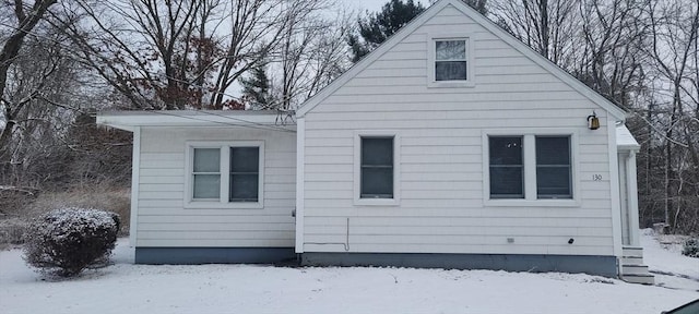 view of snow covered property