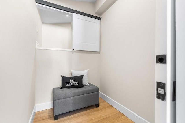 586 Lowell St, Peabody, MA 01960 - living area featuring baseboards and light wood-style flooring