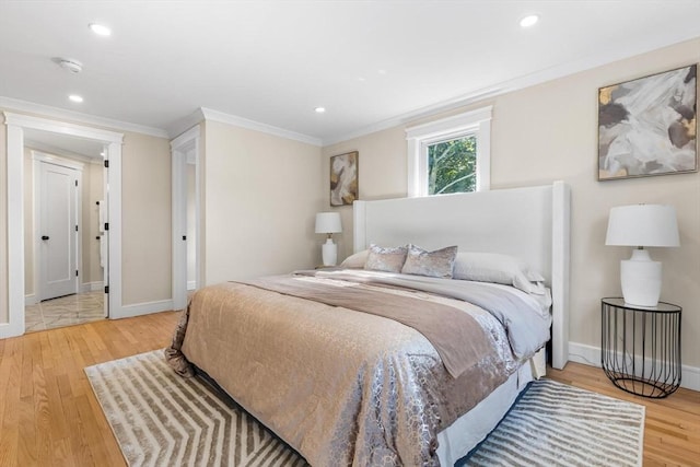 586 Lowell St, Peabody, MA 01960 - bedroom featuring wood finished floors, ornamental molding, and recessed lighting