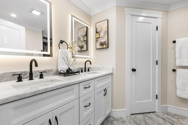 586 Lowell St, Peabody, MA 01960 - bathroom with double vanity and marble finish flooring