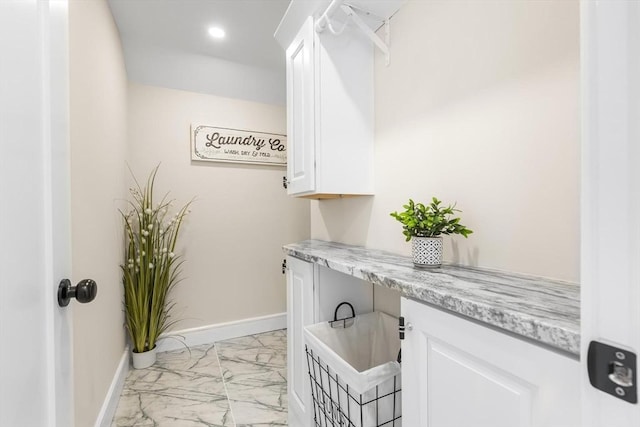 586 Lowell St, Peabody, MA 01960 - laundry room featuring light marble finish floors and recessed lighting