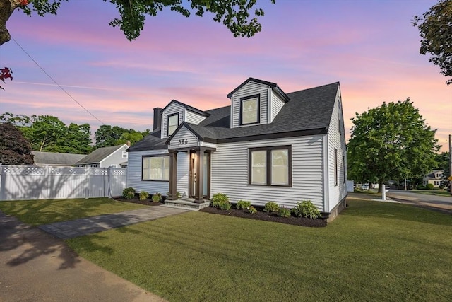 586 Lowell St, Peabody, MA 01960 - new england style home featuring a shingled roof