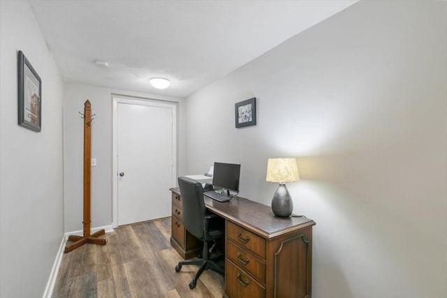 office space with hardwood / wood-style floors