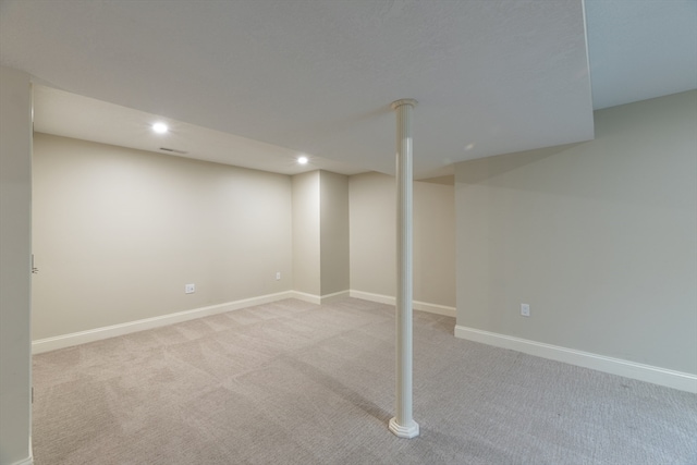 basement with light carpet