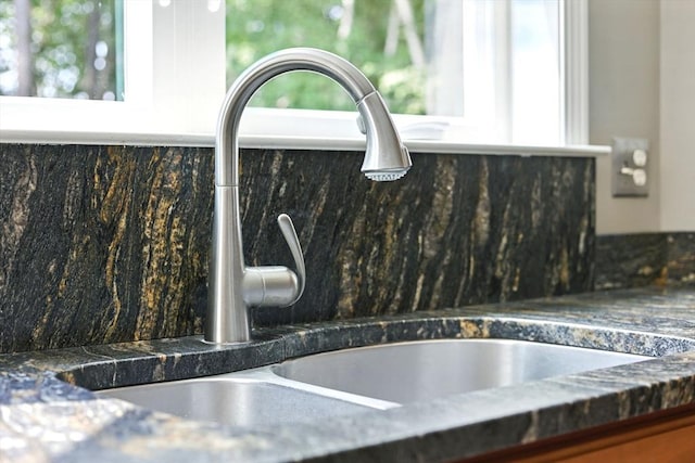 76 Wildflower Cir, Westfield, MA 01085 - kitchen view of tasteful backsplash and dark countertops