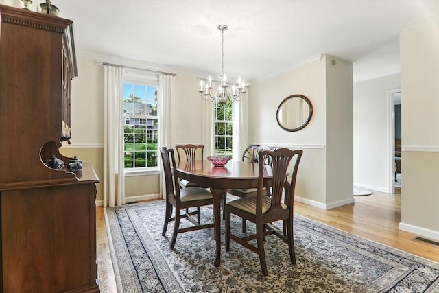 76 Wildflower Cir, Westfield, MA 01085 - dining room featuring a chandelier, light wood finished floors, and ornamental molding