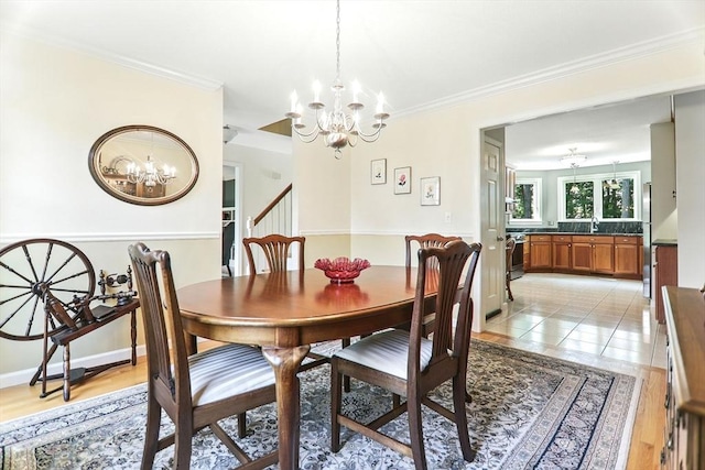 76 Wildflower Cir, Westfield, MA 01085 - dining space with a chandelier, crown molding, and light wood-style floors