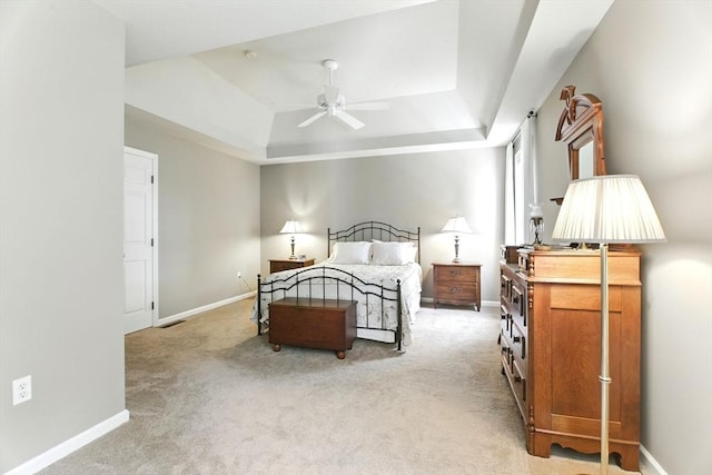 76 Wildflower Cir, Westfield, MA 01085 - bedroom with a tray ceiling and light carpet
