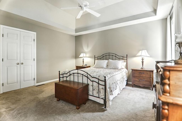 76 Wildflower Cir, Westfield, MA 01085 - carpeted bedroom featuring a raised ceiling, ceiling fan, and a closet