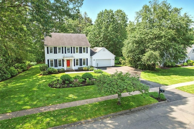 76 Wildflower Cir, Westfield, MA 01085 - colonial home with driveway, a garage, and a front yard