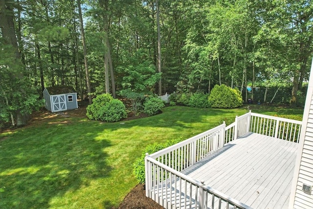 76 Wildflower Cir, Westfield, MA 01085 - wooden deck with a storage unit and a lawn