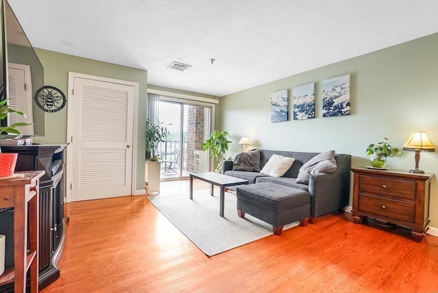 230 Willard St Unit 412, Quincy, MA 02169 - living room with light wood-type flooring and baseboards