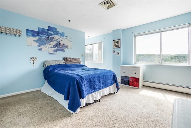 230 Willard St Unit 412, Quincy, MA 02169 - bedroom with carpet, a baseboard heating unit, and baseboards