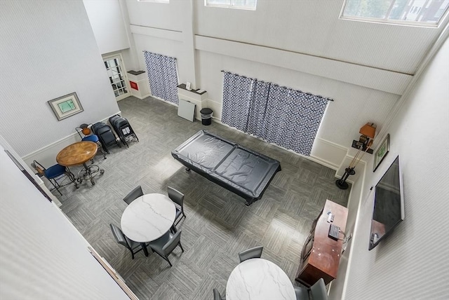 230 Willard St Unit 412, Quincy, MA 02169 - living room featuring healthy amount of natural light and baseboards