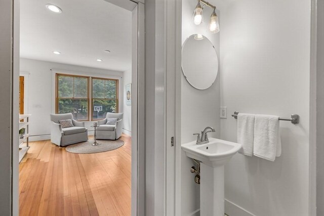 454 Webster St, Needham, MA 02494 - bathroom featuring recessed lighting, wood finished floors, and a sink