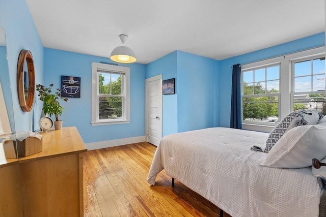 454 Webster St, Needham, MA 02494 - bedroom with light wood-type flooring and baseboards