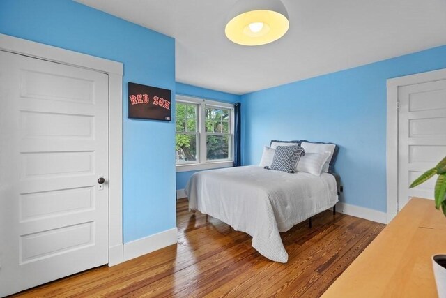 454 Webster St, Needham, MA 02494 - bedroom with wood finished floors and baseboards