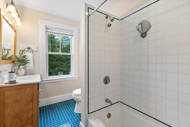 454 Webster St, Needham, MA 02494 - bathroom with toilet, vanity, tile patterned flooring, shower / washtub combination, and baseboards