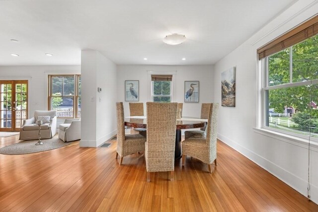 454 Webster St, Needham, MA 02494 - dining space with baseboards, light wood-style flooring, and recessed lighting