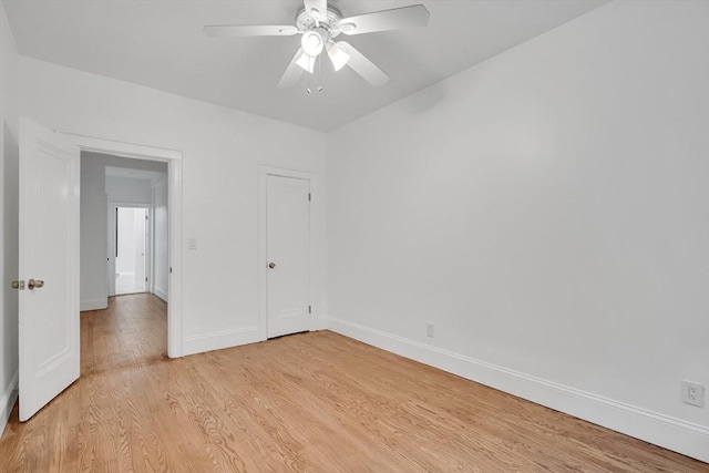 spare room with ceiling fan and light hardwood / wood-style flooring