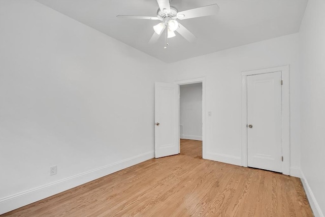 unfurnished bedroom featuring light hardwood / wood-style flooring and ceiling fan