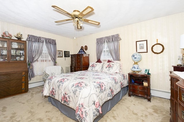 254 Pilgrim Ave, Worcester, MA 01604 - carpeted bedroom featuring baseboard heating, multiple windows, a ceiling fan, and wallpapered walls