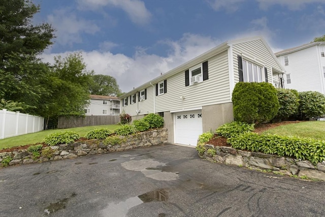 254 Pilgrim Ave, Worcester, MA 01604 - view of front of property with a garage and asphalt driveway