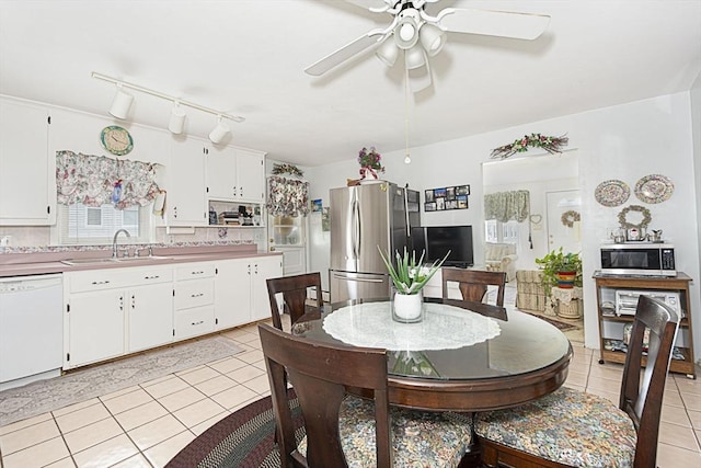254 Pilgrim Ave, Worcester, MA 01604 - dining area featuring light tile patterned floors and ceiling fan