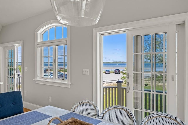 306 Millway, Barnstable, MA 02630 - dining space featuring a water view, baseboards, and wood finished floors