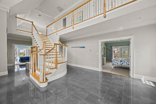 306 Millway, Barnstable, MA 02630 - stairway with granite floors, baseboards, a towering ceiling, and ornamental molding