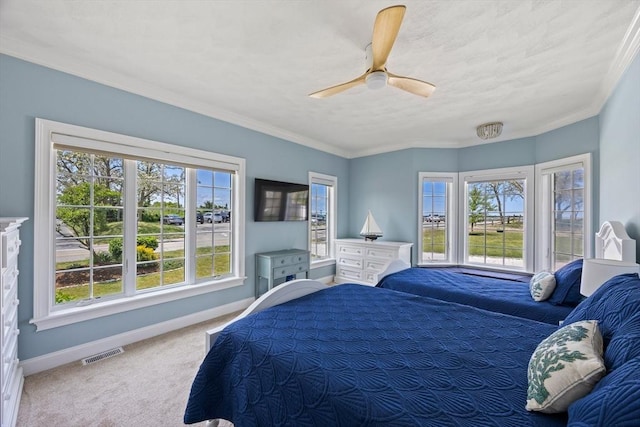 306 Millway, Barnstable, MA 02630 - carpeted bedroom with baseboards, multiple windows, ornamental molding, and ceiling fan