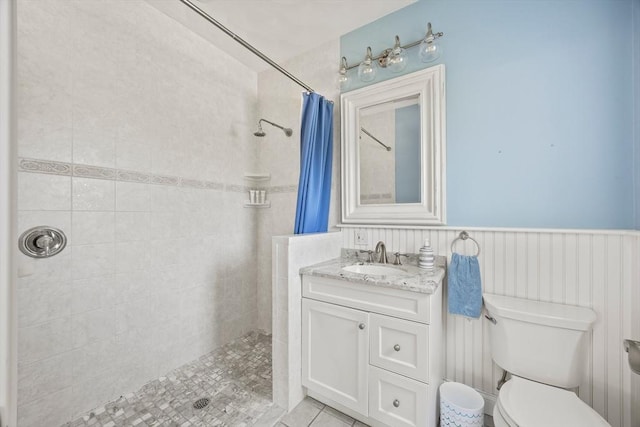 306 Millway, Barnstable, MA 02630 - full bathroom with a tile shower, toilet, vanity, and tile patterned floors