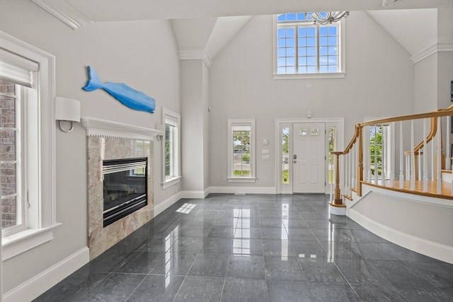 306 Millway, Barnstable, MA 02630 - entrance foyer with granite floors, baseboards, stairs, and high vaulted ceiling