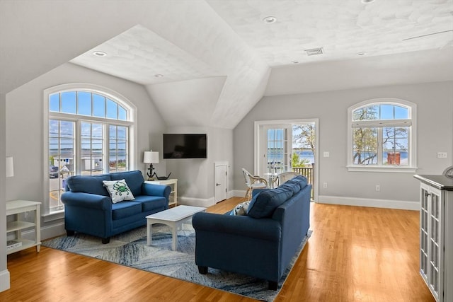 306 Millway, Barnstable, MA 02630 - living room featuring light wood-type flooring, baseboards, and lofted ceiling