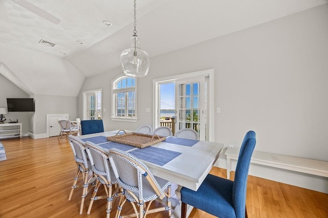306 Millway, Barnstable, MA 02630 - dining space featuring light wood-style flooring, lofted ceiling, and baseboards