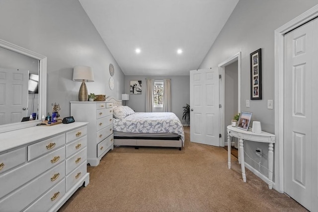 carpeted bedroom featuring lofted ceiling and recessed lighting