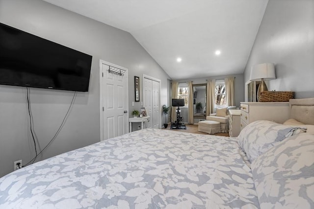 bedroom with vaulted ceiling and recessed lighting