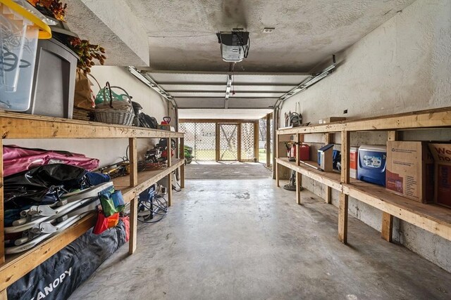 garage featuring a garage door opener