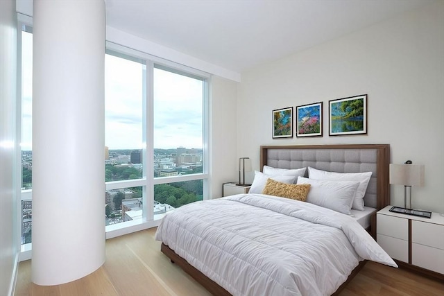 bedroom featuring light wood-type flooring