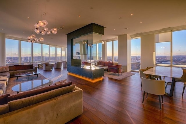 interior space with dark hardwood / wood-style floors and an inviting chandelier