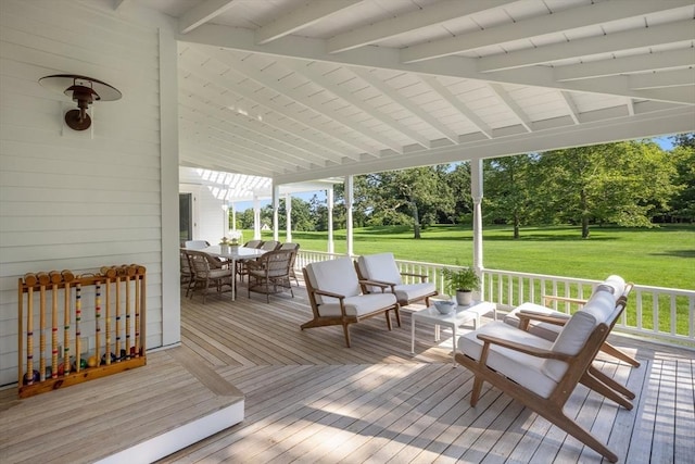41 Cobbs Hill Rd, Chilmark, MA 02535 - wooden deck with outdoor dining space and a yard