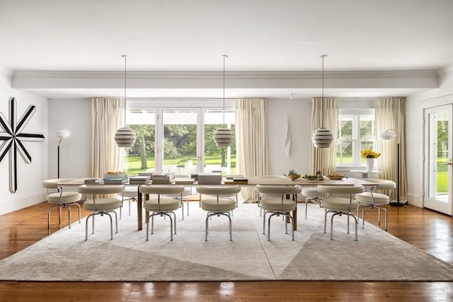 41 Cobbs Hill Rd, Chilmark, MA 02535 - dining area with hardwood / wood-style floors, crown molding, and baseboards