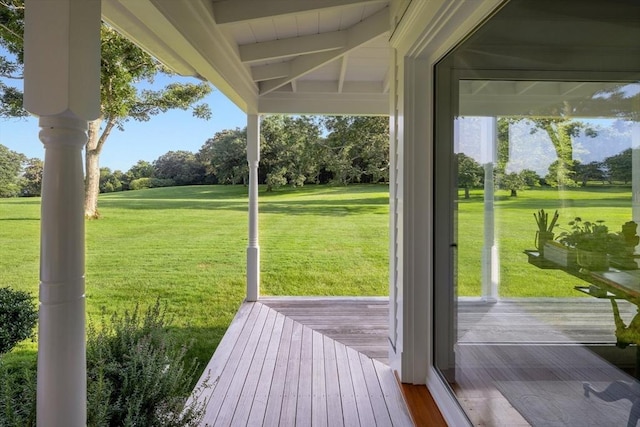 41 Cobbs Hill Rd, Chilmark, MA 02535 - entryway with beamed ceiling, wood finished floors, view of scattered trees, and healthy amount of natural light