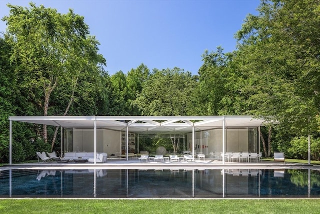 41 Cobbs Hill Rd, Chilmark, MA 02535 - surrounding community with a patio area and a pool