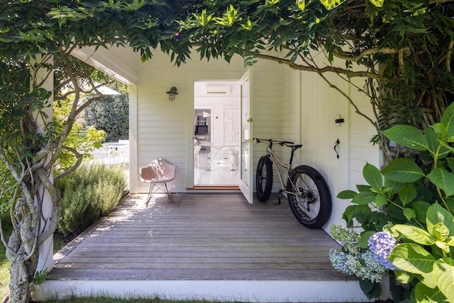 41 Cobbs Hill Rd, Chilmark, MA 02535 - wooden terrace with an AC wall unit and a porch