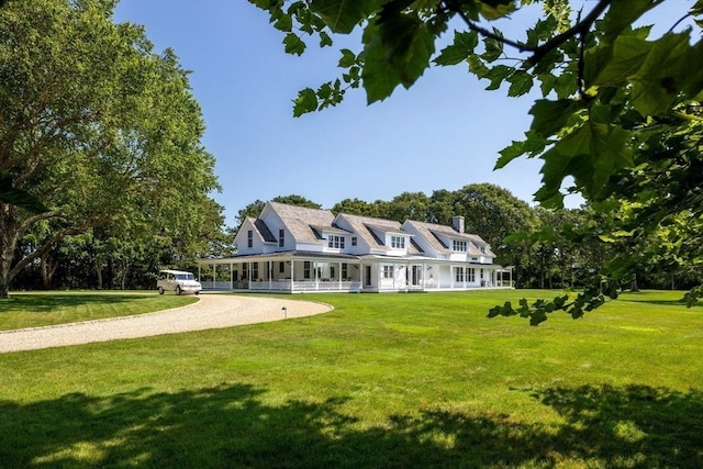 41 Cobbs Hill Rd, Chilmark, MA 02535 - view of front facade with a front yard, a porch, and driveway