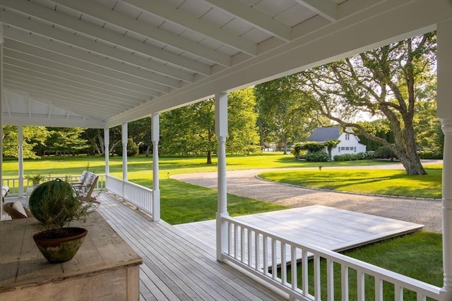 41 Cobbs Hill Rd, Chilmark, MA 02535 - wooden terrace featuring a lawn and covered porch