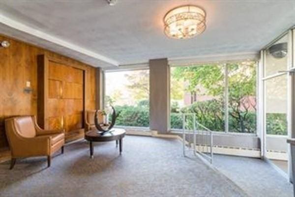 sitting room with a baseboard radiator